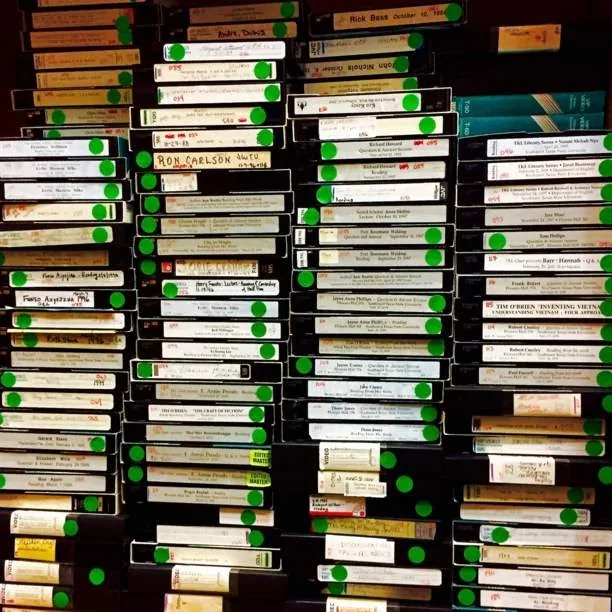 Stacks of labelled VHS tapes pulled from an archive