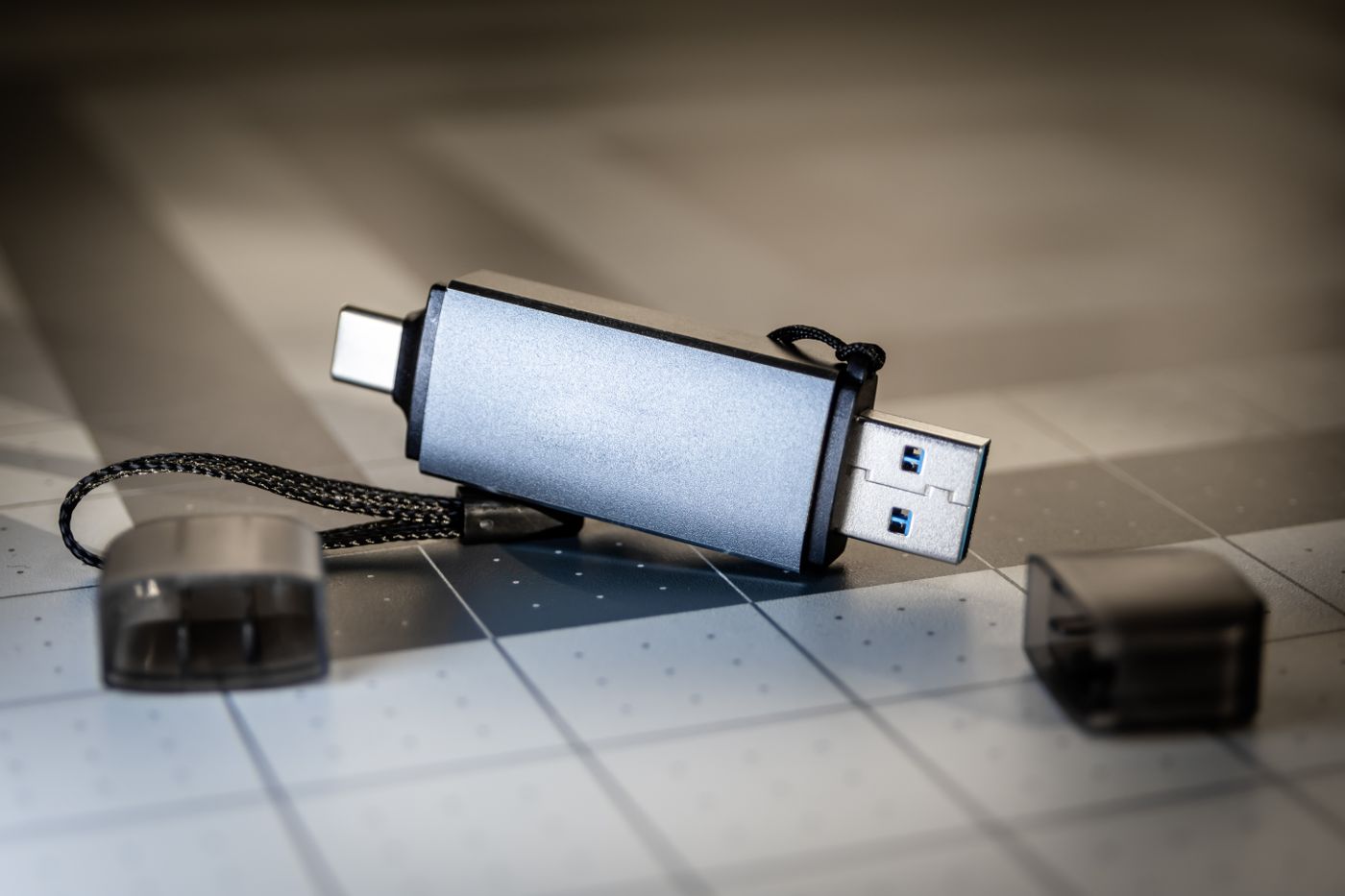 Close-up of a compact USB flash drive with USB-A and USB-C connectors.